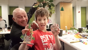 Boy, Freddie, with Grandad Phil.